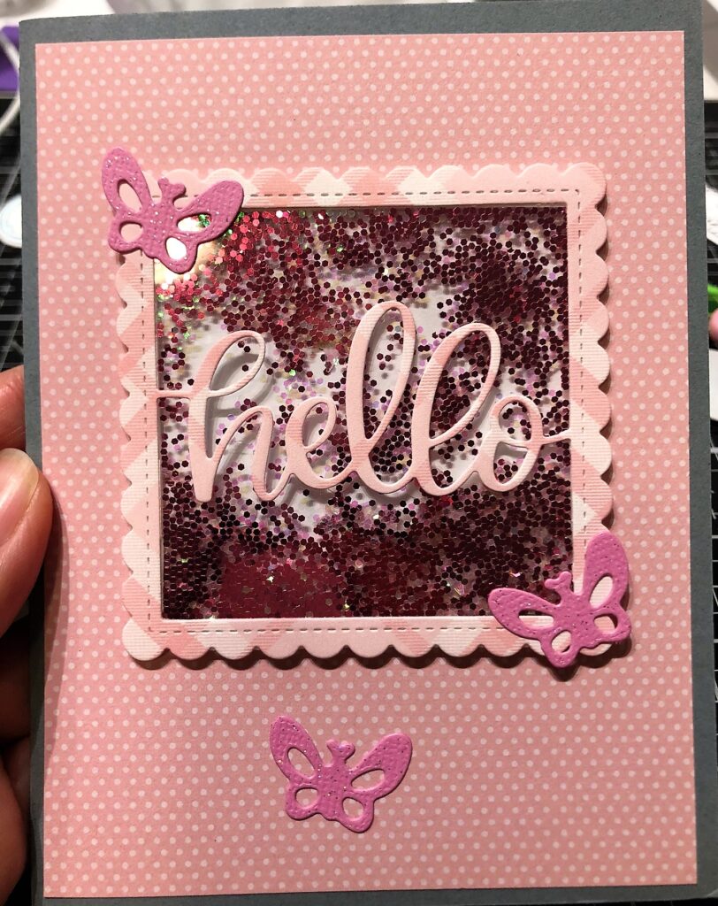 Hello card with a shaker square in the middle and butterflies using Pretty Pink Posh Hello Shaker Die