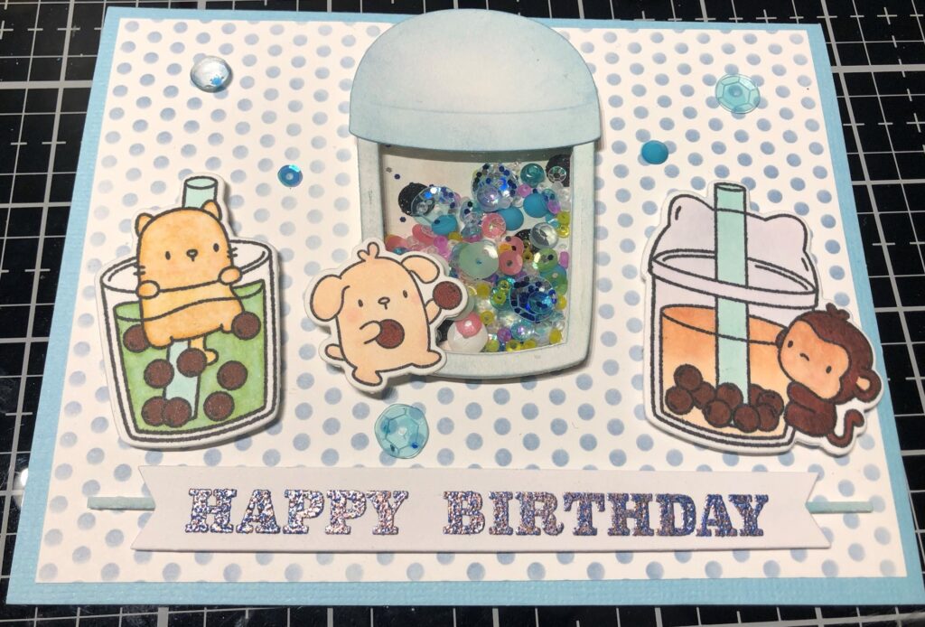 Birthday card with little cartoon animals and boba drinks with a boba cup shaker in the middle made with Mama Elephant Boba Tea stamp and die set