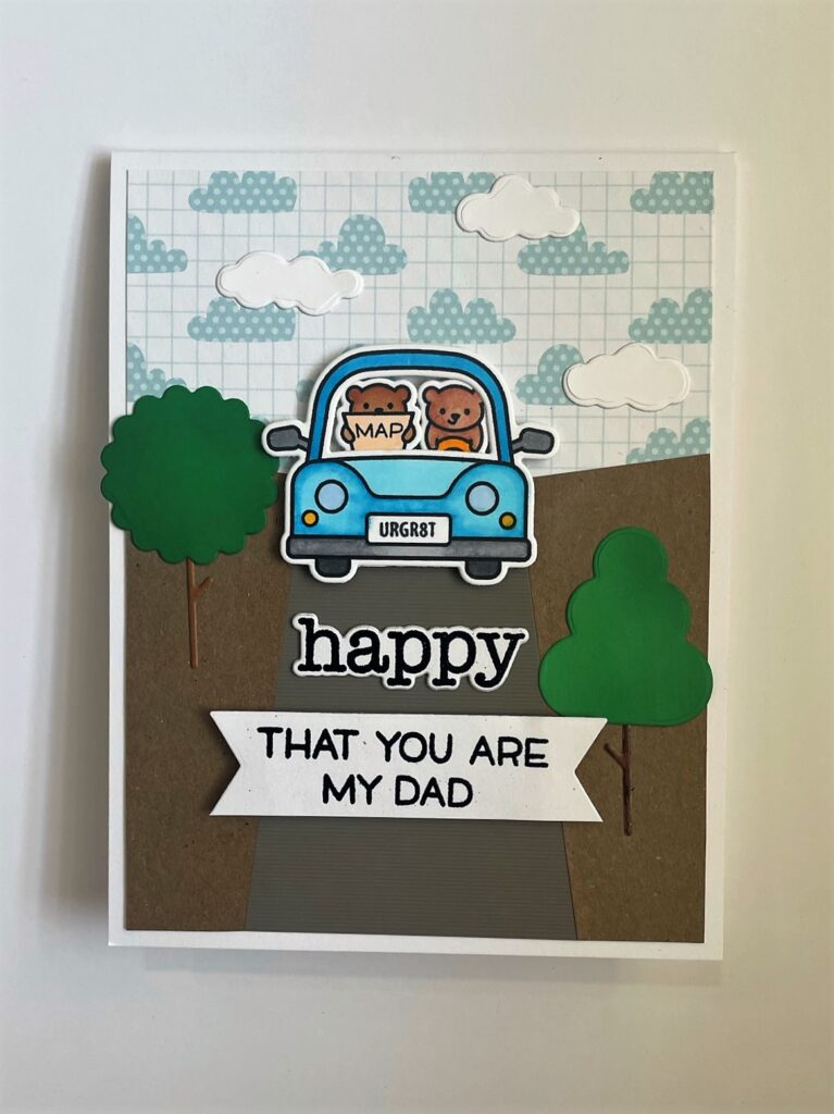Father's Day card with two little bears in a blue car on the road that says "happy that you are my dad"