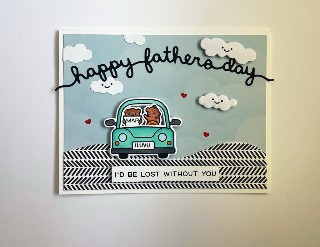Happy Father's Day card with two little bears in a bluish-green car on the road that says Happy Father's Day at the top of the card and "I'd be lost with you" underneath the car